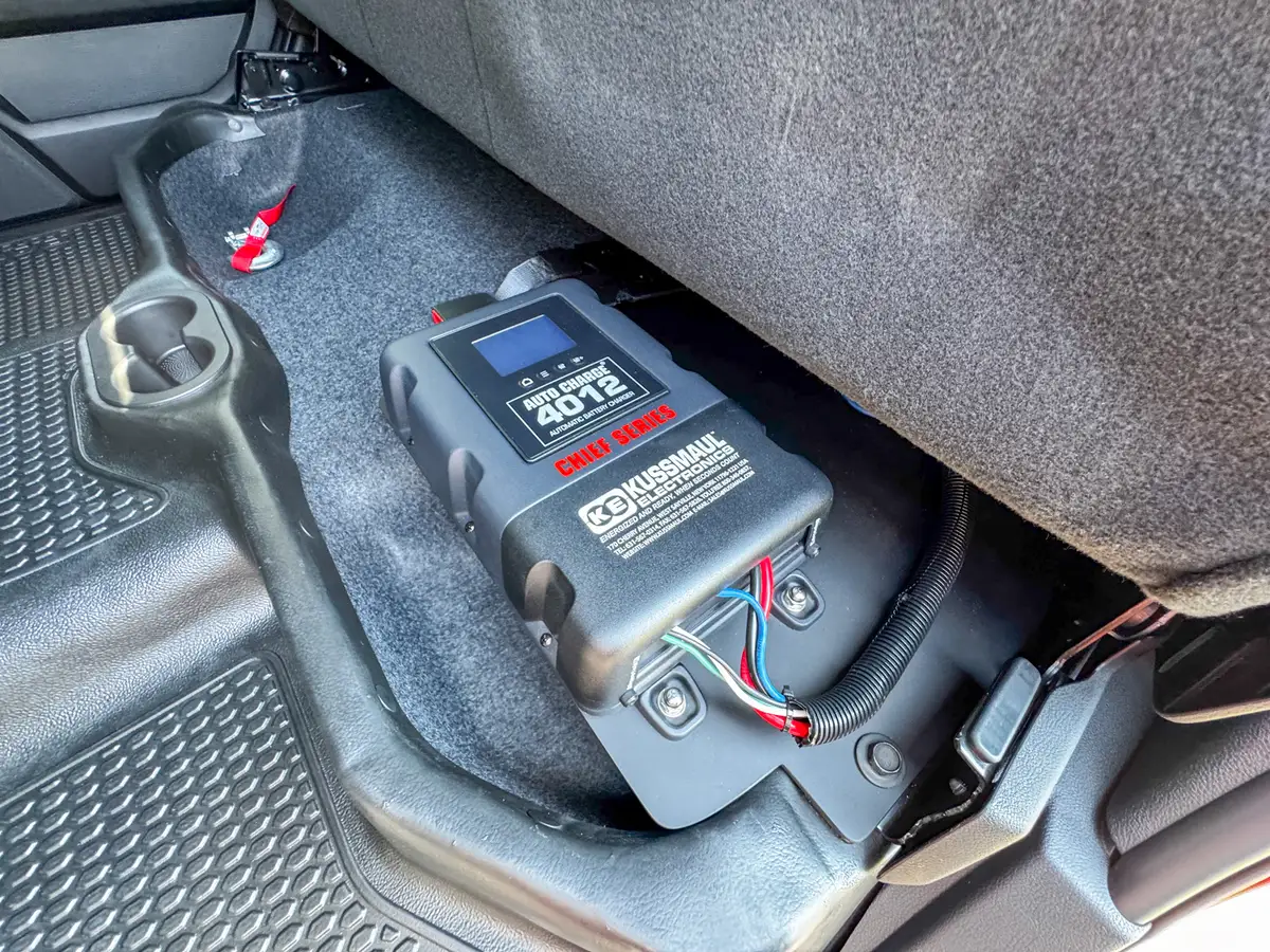 Rear footwell view showing center console base and rear seating area.